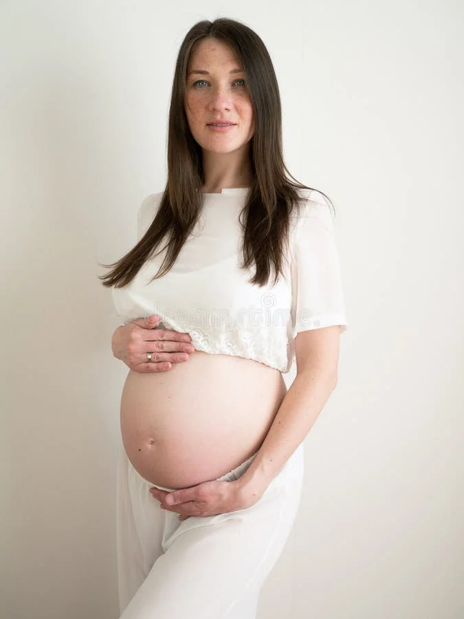 pregnant woman bare belly sexy